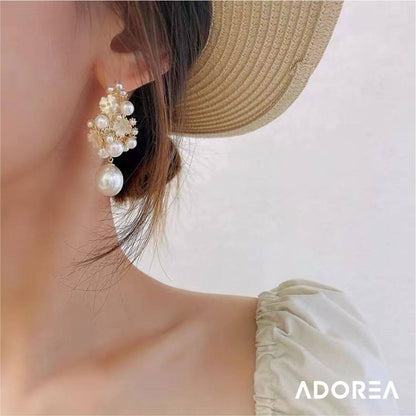 ARETES GUIRNALDAS DE PERLAS