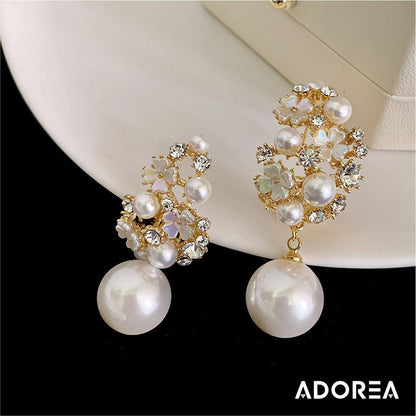 ARETES GUIRNALDAS DE PERLAS